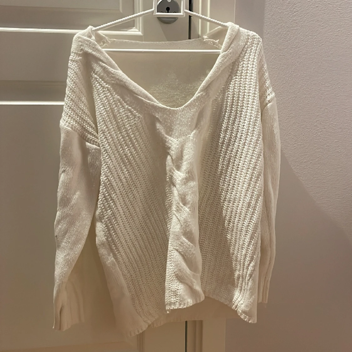 vit stickad tröja