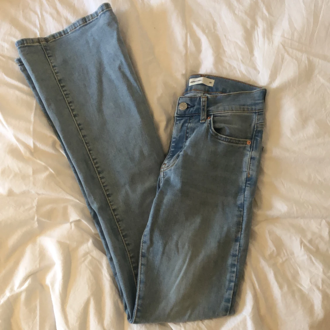 Low waist bootcut jeans, storlek 32 - 91