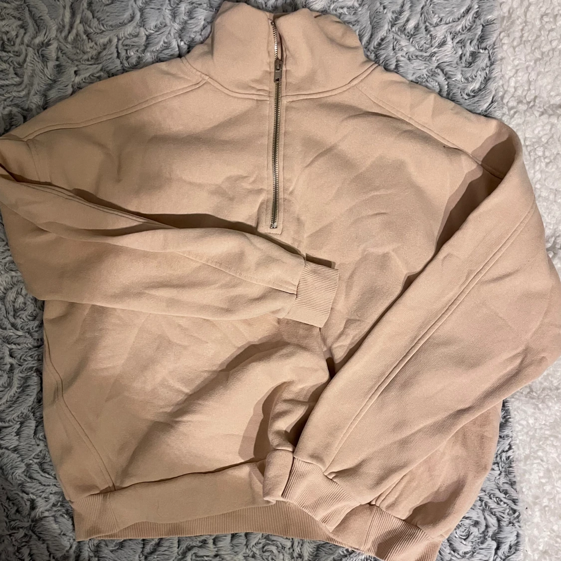Beige tjocktröja
