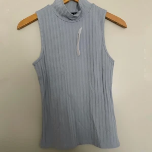 Polo topp  - Polo topp från ginatricot köpt för några år sen  Aldrig använd 