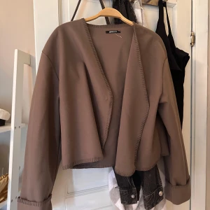 Kappa - Super fin kappa från Gina som aldrig blivit använd säljer då den inte passar min still.