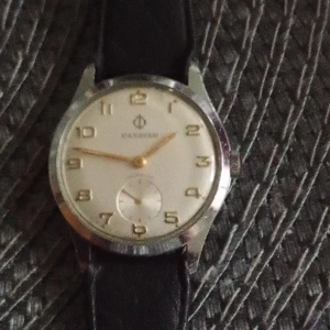 Vintage Dam/herr klocka Candino Incanloc nr 10195. - Vintage Fin dam/herr klocka Candino Incanloc nr 10195 med läderarmband lite repigt glas.nytt batteri behövs.