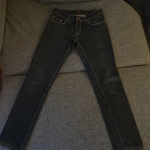 Crocker jeans (Levis)  - Storlek 34, oanvända, mörkblå, low waisted, gammal modell 