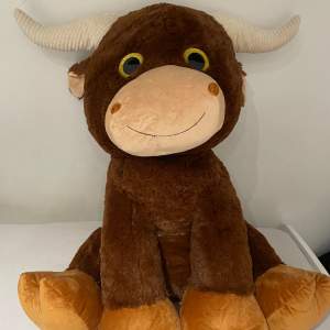 Bemiro XXL Bull plush toy with horns sitting apporx. 80 cm