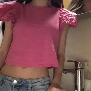 Fin volang topp - En fin rosa topp