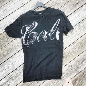 T-shirt - Svart T-shirt strl M passar S