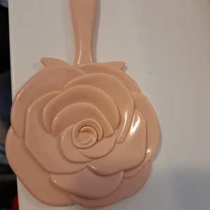 Mirror - A brand new morror.  Small in size but its very easy to carry around to all places and bags.