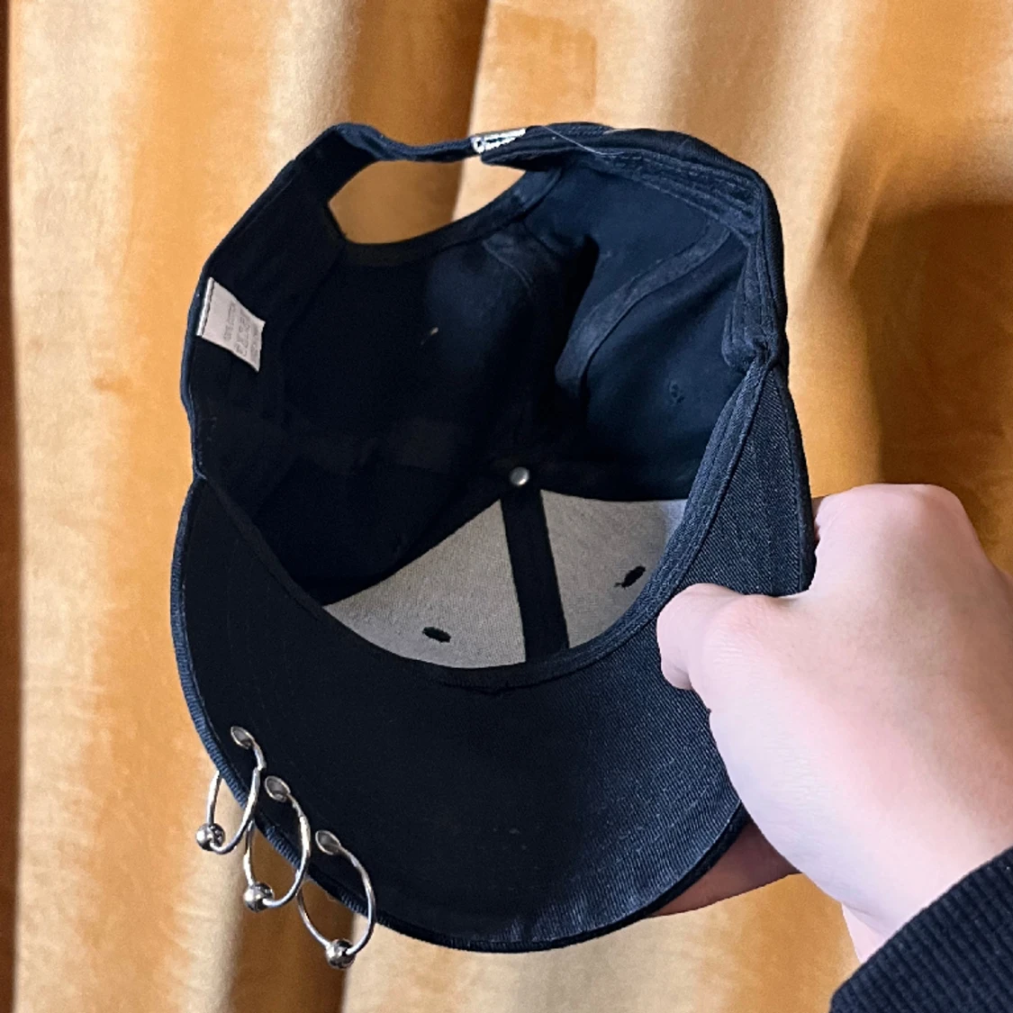 Keps med ringar  - 91