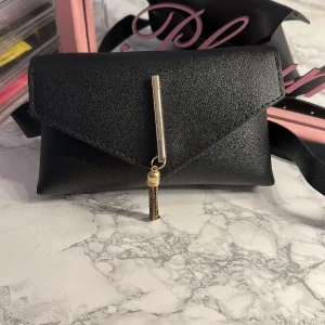 Väska - En midjeväska/Bältesväska 