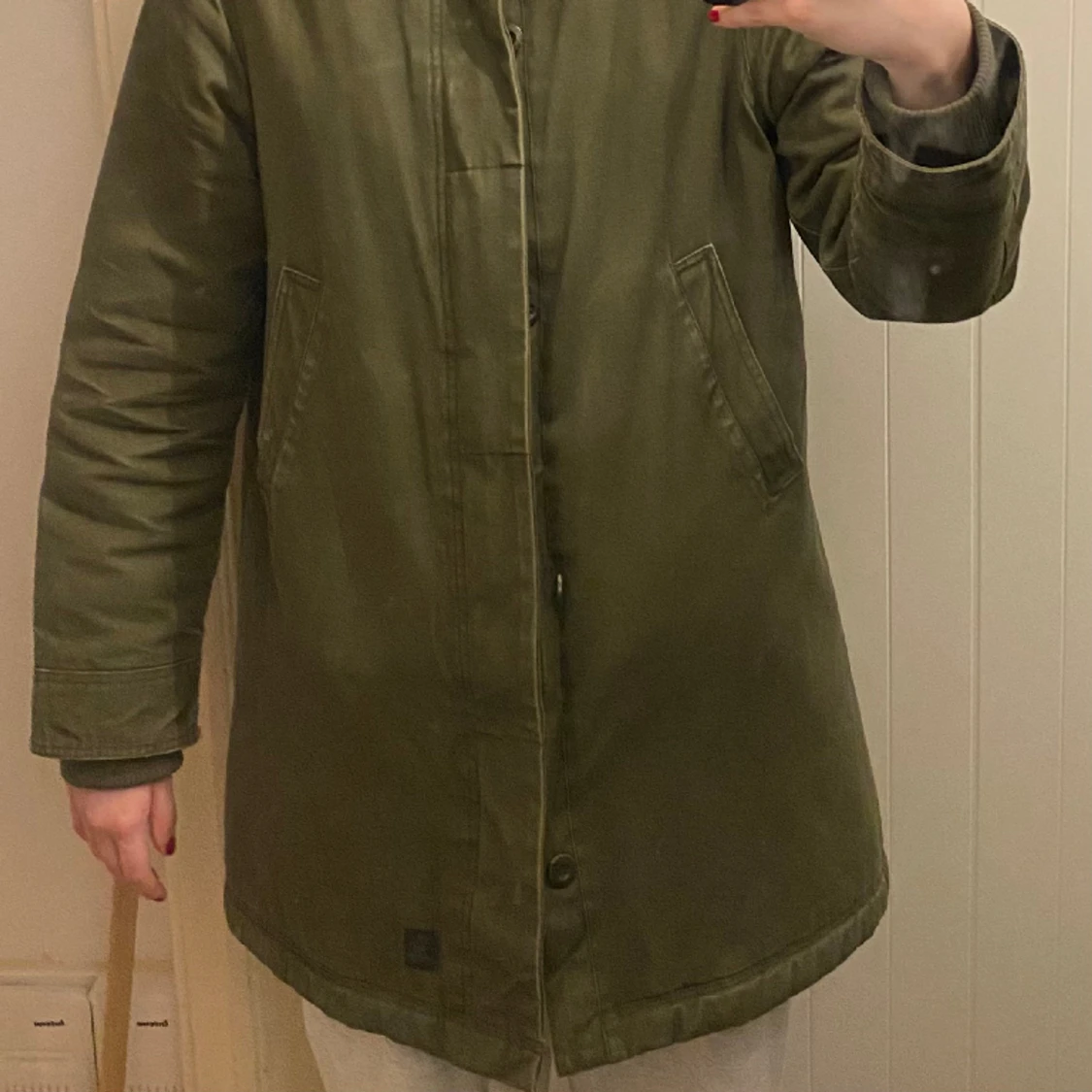 grön jacka  - 90