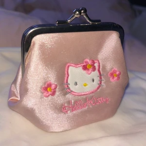 Hello Kitty  - Hello kitty Coin Purse från sanrio.  Fint skick! 