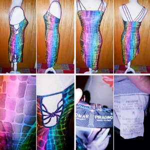 Partyklänning, klänning  - One size klänning,stretch. Denna klänning blir du ensam om. Köpt i Italien av känd designer. Flerfärgad.