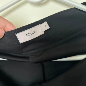  kostymbyxor - Oanvända nelly kostymbyxor Strl S super fin form!! Passar även Xs.