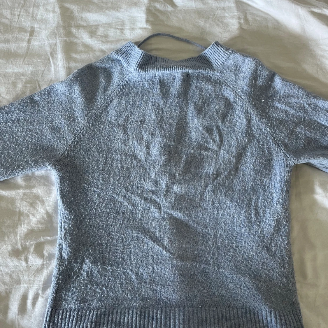 Blå stickad tröja - 90