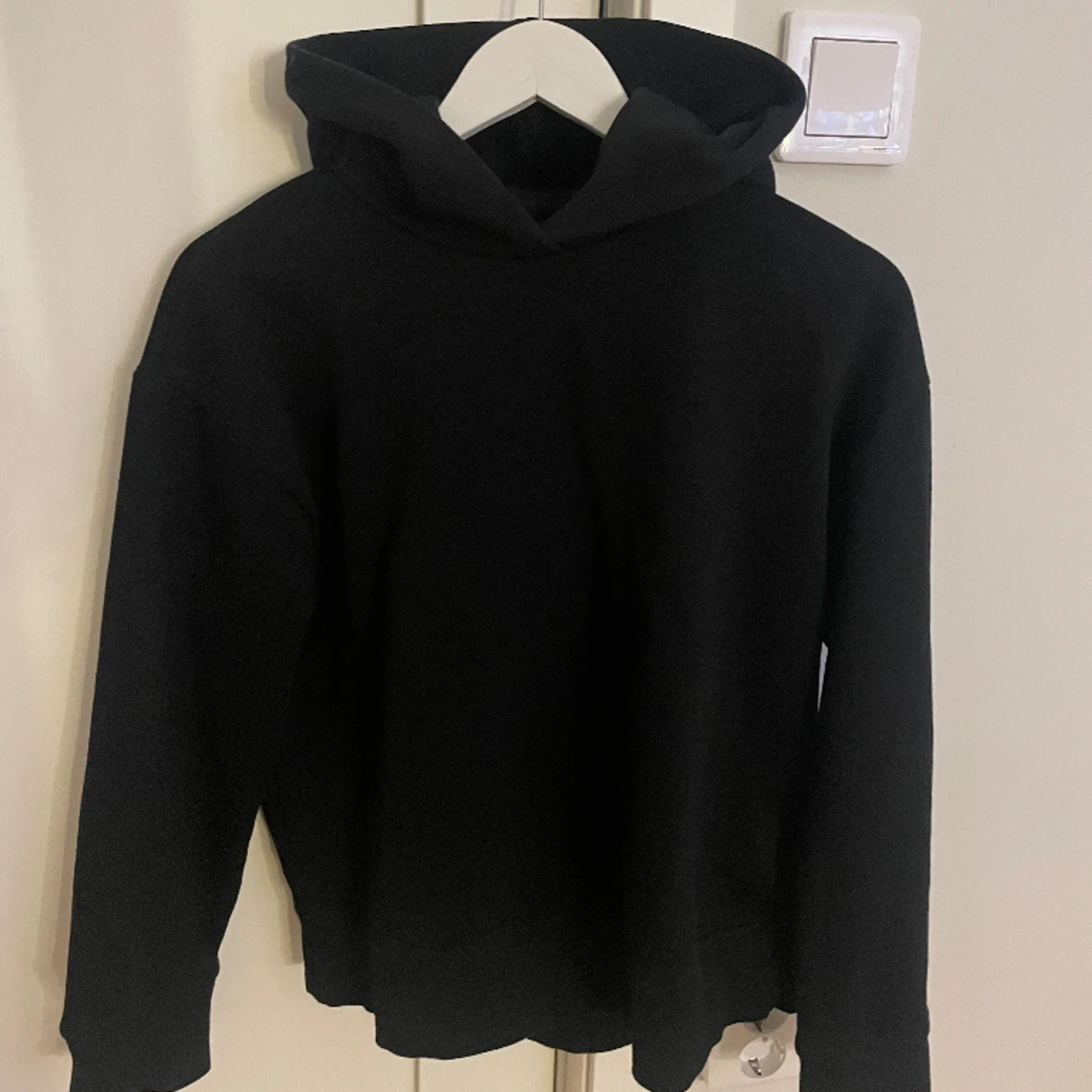 Svart hoodie 