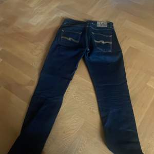 Ett par helt nya och oanvända Nudie jeans i storlek W27 L32