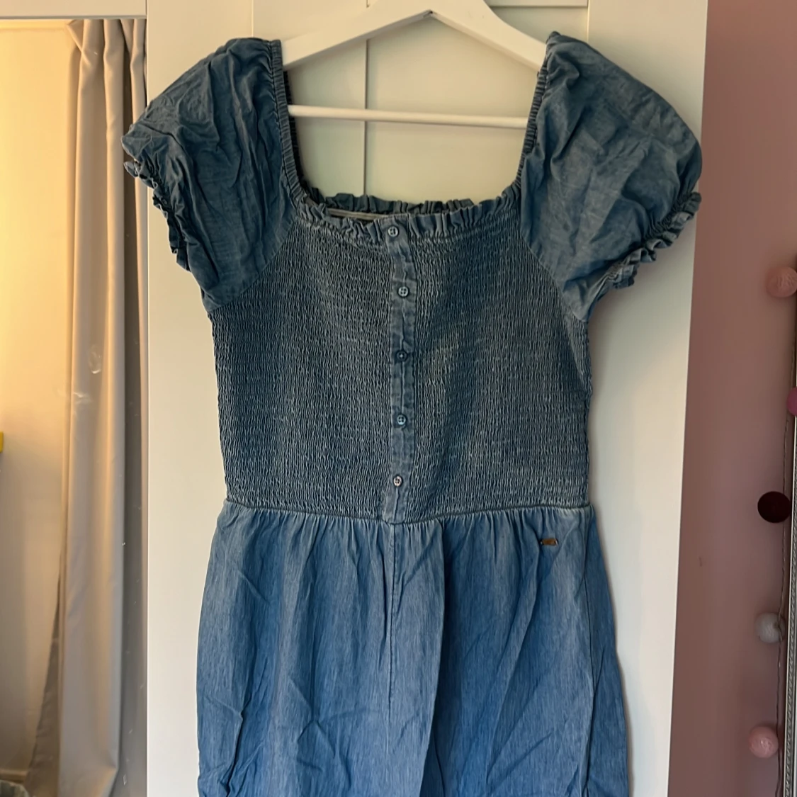 En blå jumpsuit  - 90