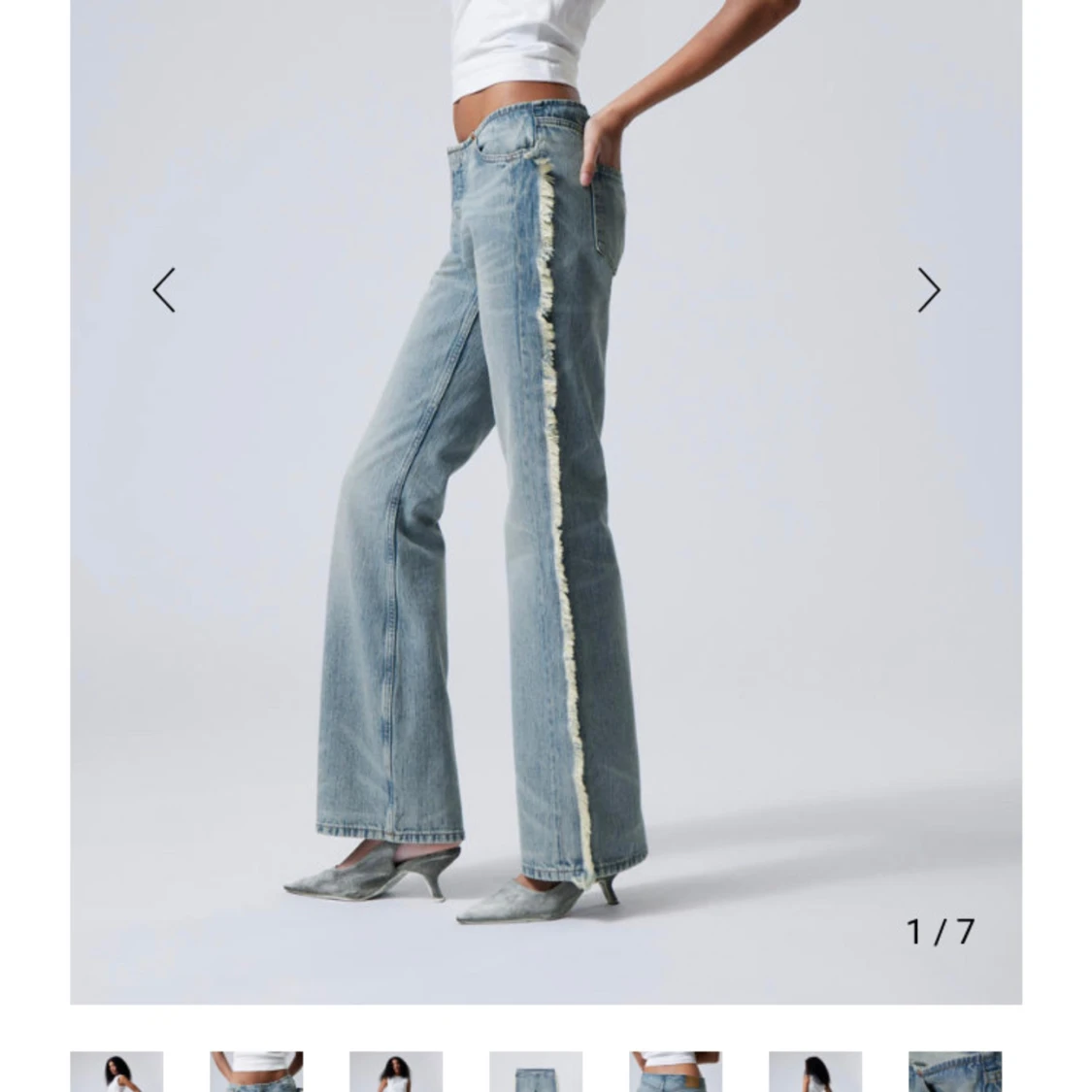 Lågmidjade bootcut jeans med fransar