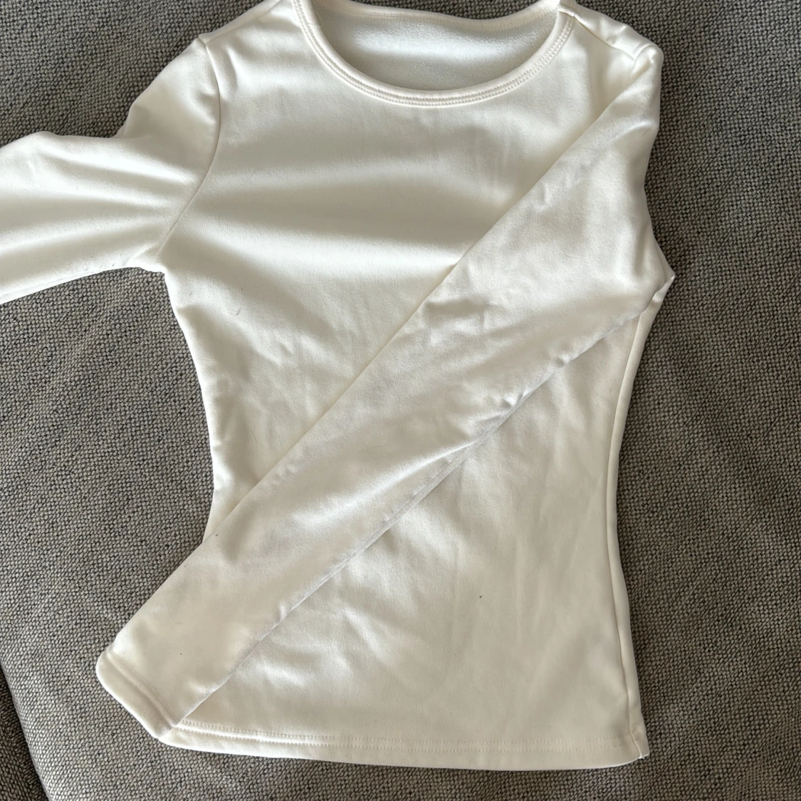 Vit långärmad tröja