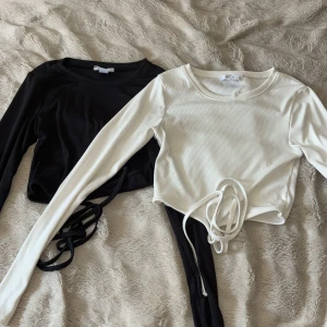 Knyttröjor - Basic långärmade tröjor som man kan knyta vid magen eller ryggen. Storlek xs från new yorker. Superfint skick. Båda tröjorna för 50kr