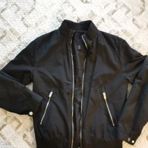 Men jacket  - Worn a few times. Jacket is neat. 