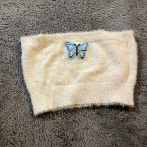 Tube top  - Jätte söt tube top som är perfekt för sommaren och paras bra med en tjockare tröja över. 