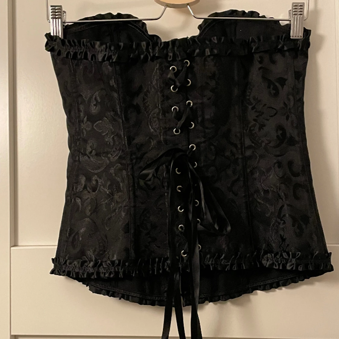 Svart korsett - 91