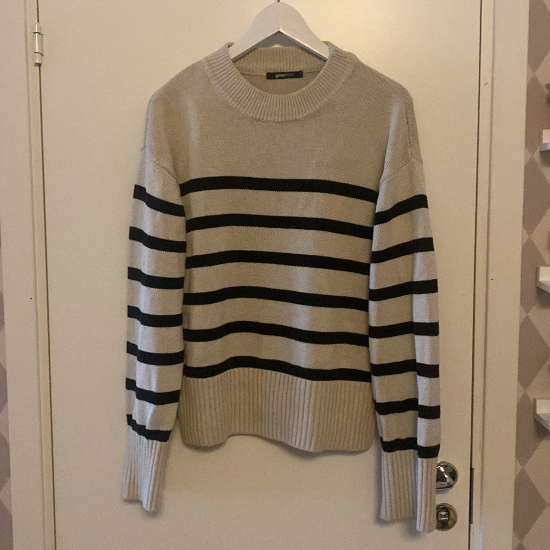 Randig stickad tröja - 90