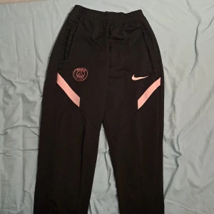 Psg byxor svart rosa - Bra skick 