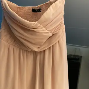 En rosa klänning från vila