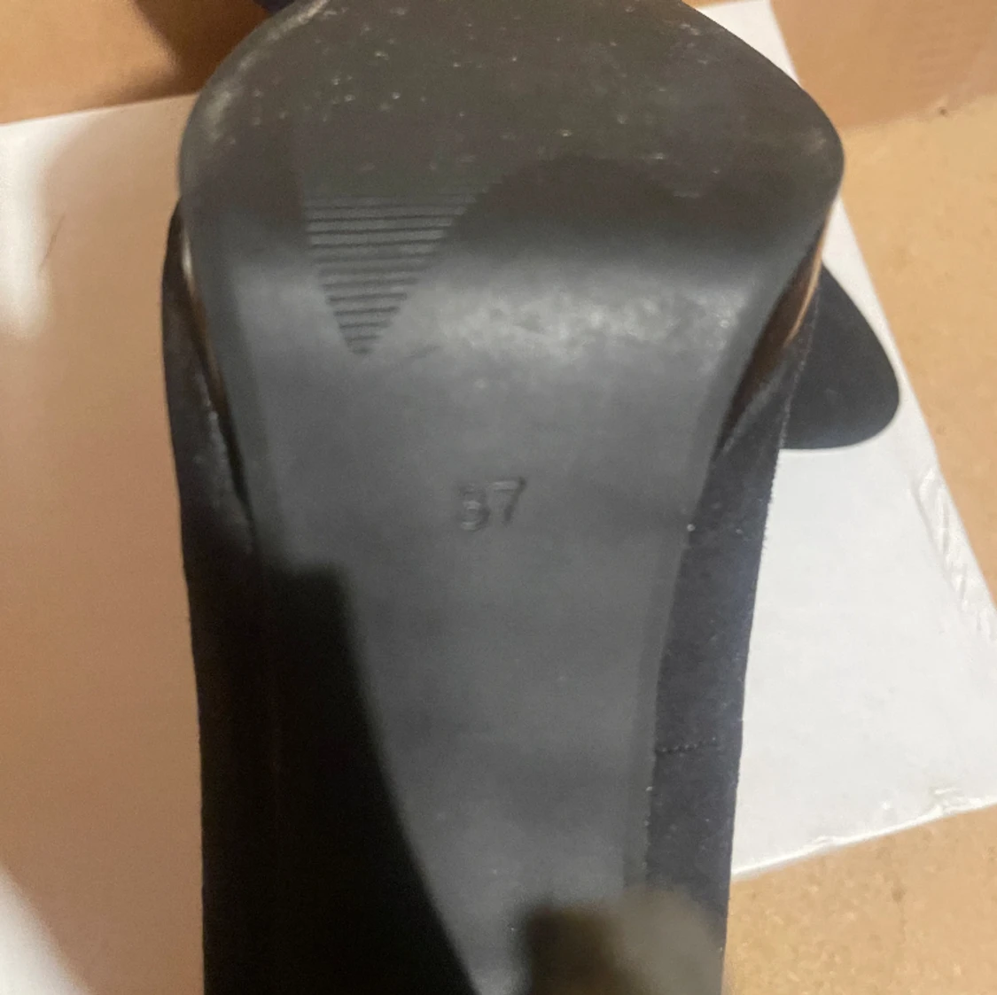 Svarta klackskor  - 91