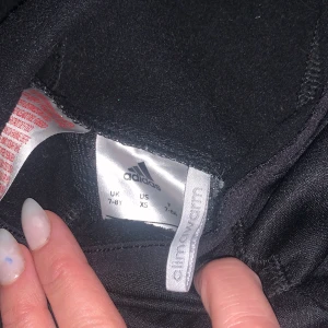 Adidas childrens training hoodie.Age 7-8 - Adidas black training hoodie. Age 7-8.