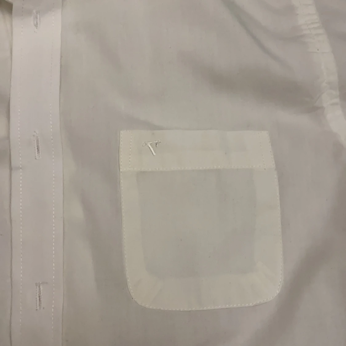 En vit skjorta, storlek 9-10 år  - 91