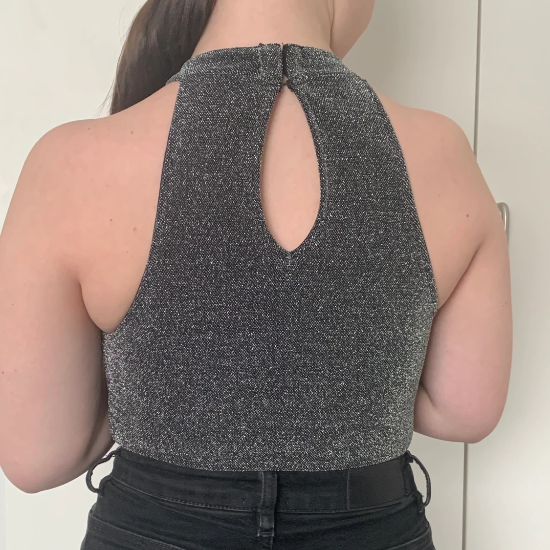 Glittrig body från H&M - 90