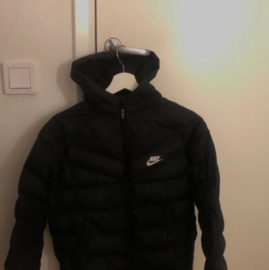 Svart Nike jacka strl 147-158