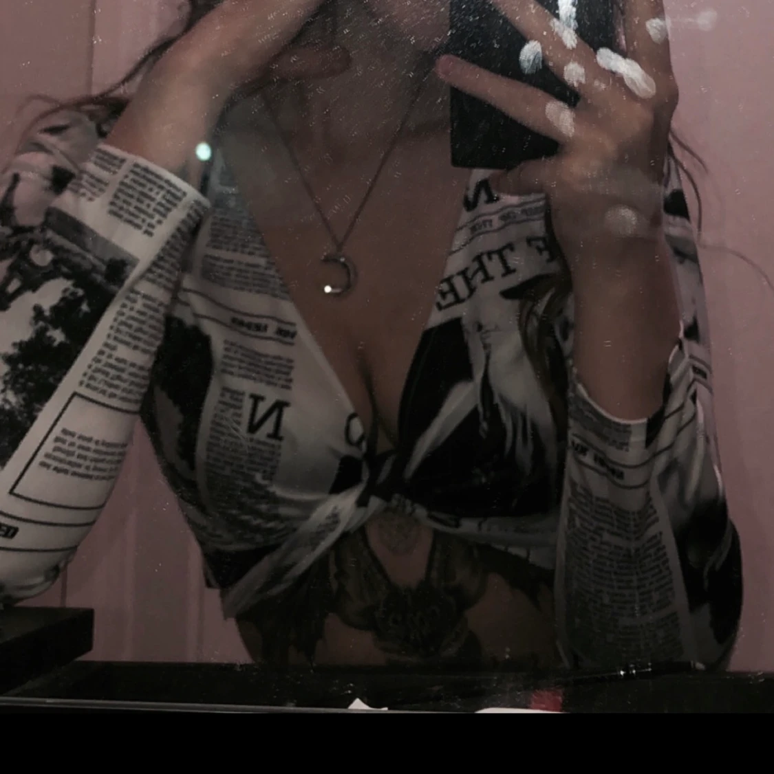 Newspaper print knot top