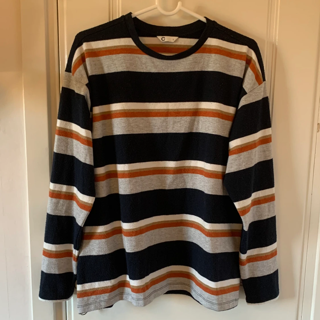 Långärmad randig tröja strl L