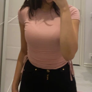 Rosa topp - I superbra skick.