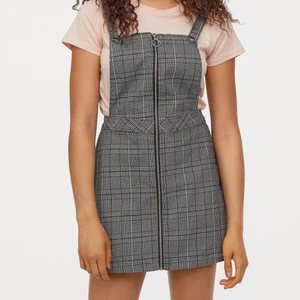 black & white plaid dress overalls - black and white dress overalls with clip button straps and a zip down the middle. worn only a few times so basically new condition 