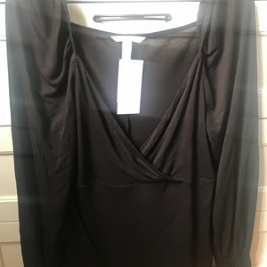 Hm top - Hm top omlott helt ny i storlek L. 