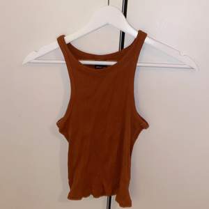 Orange/brun linne från Gina tricot i stl XS