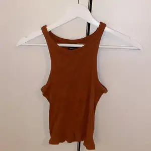 Orange/brun linne från Gina tricot i stl XS