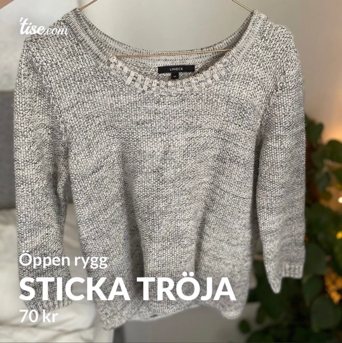 Stickad tröja med öppen rygg