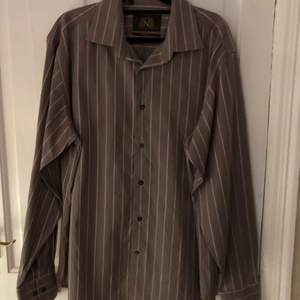Men’s next shirt in great condition size M/L colour brown/pink