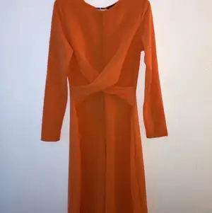 Orange jumpsuit. 