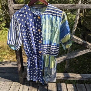 Vintage playsuit jumpsuit  - Super cute playsuit that just doesn't fit me anymore. I got this from a vintage store when I lived in London. It's really light on and sits reallt nice with the elasticated waist. I often wore it with the buttons open and a top underneath. It's on fantastic condition and has been well looked after. Any questions just ask 🙂👍 