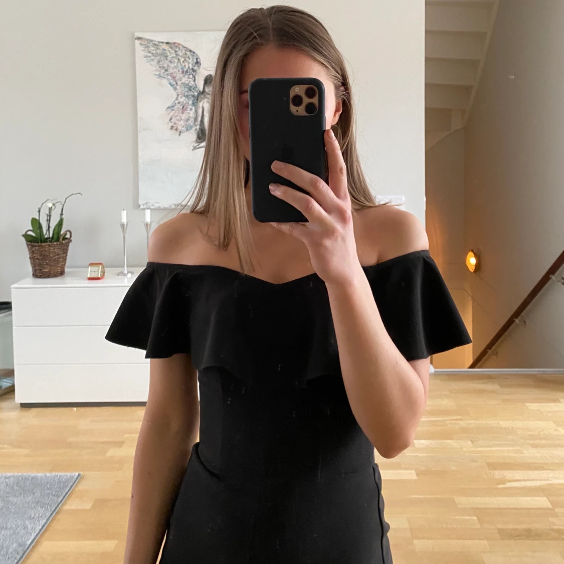 Svart byxdress