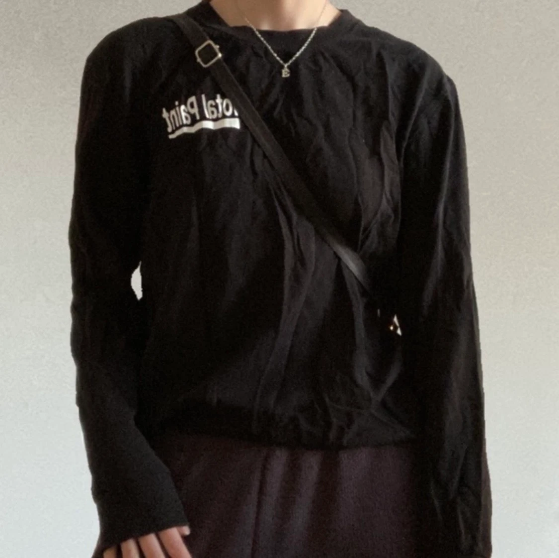 Svart tröja med tryck