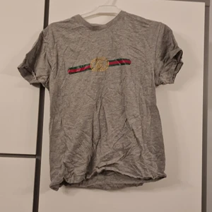 T-shirt  - Inte äkta, trycket sitter lite dåligt