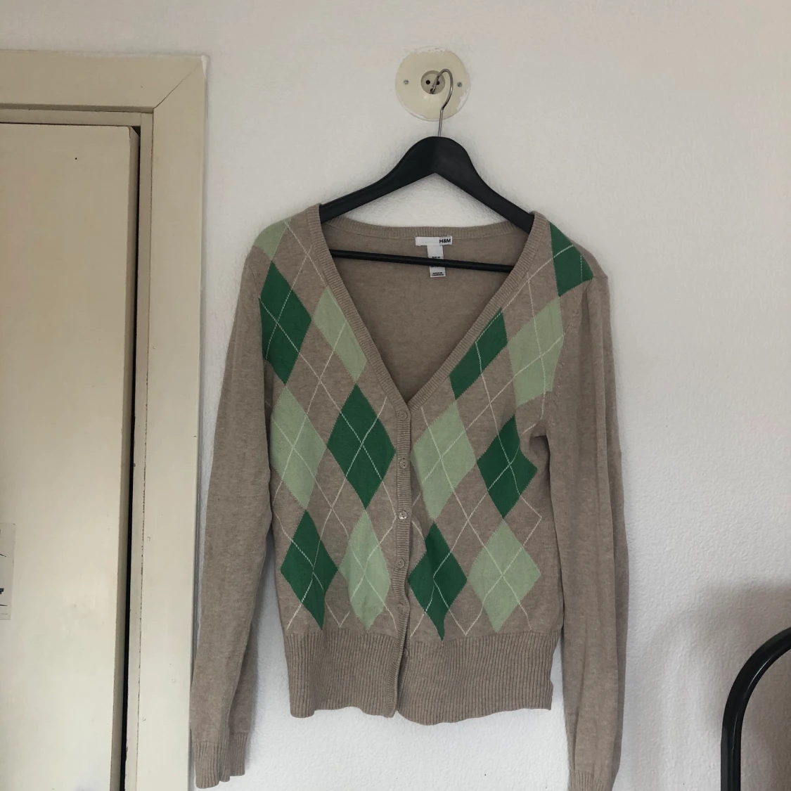 Kofta med rutmönster